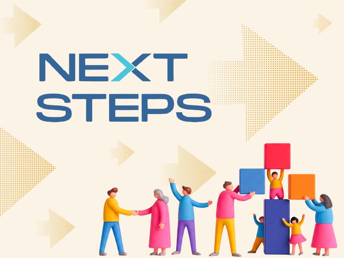 Aerial shot of field with people forming the words "SLE"